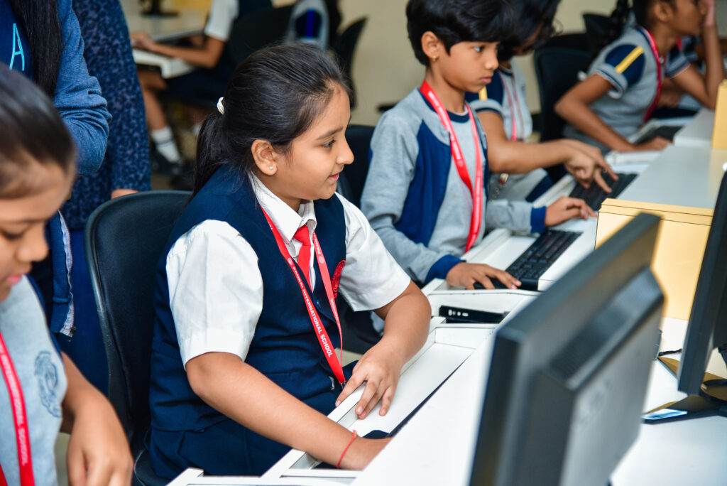 Digital exploration: Students engrossed in a computer lab session at Panbai International School, embracing technology for learning