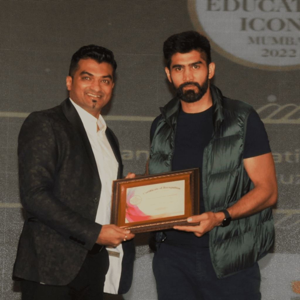 Panbai International School, one of the top Cambridge schools in Mumbai, honoured at Times of India School Survey Awards 2022 by Boxer Vijendra Singh