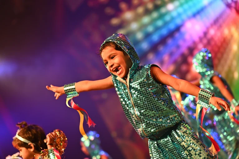 Nursery student performing on stage at Panbai International School’s Annual Day celebration.