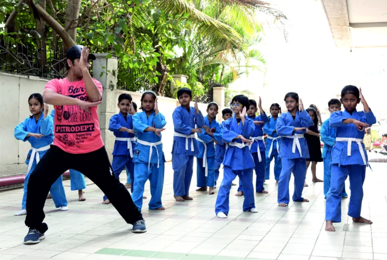 Mixed Martial Arts training session at Panbai International School with instructor and students practicing