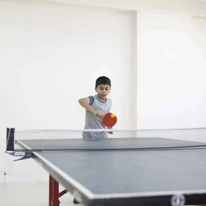 tudents practising table tennis at Panbai International School