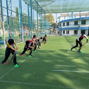 Students participating in cricket training at Panbai International School