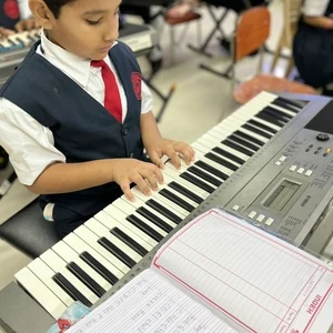 Students participating in a music activity at Panbai International School