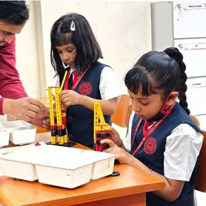 Students participating in a hands-on STEM activity at Panbai International School